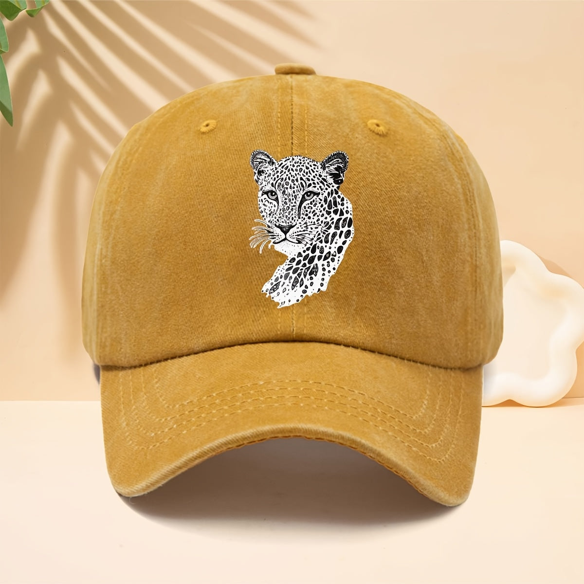 A Trendy Baseball Cap with a Black and White Leopard Head Illustration Print, Featuring a Soft Crown and Curved Brim. This Classic Snapback Hat Is an Adjustable Casual Cap Suitable for All Seasons. It's a Six-panel Trucker Hat, a Matching Couple's